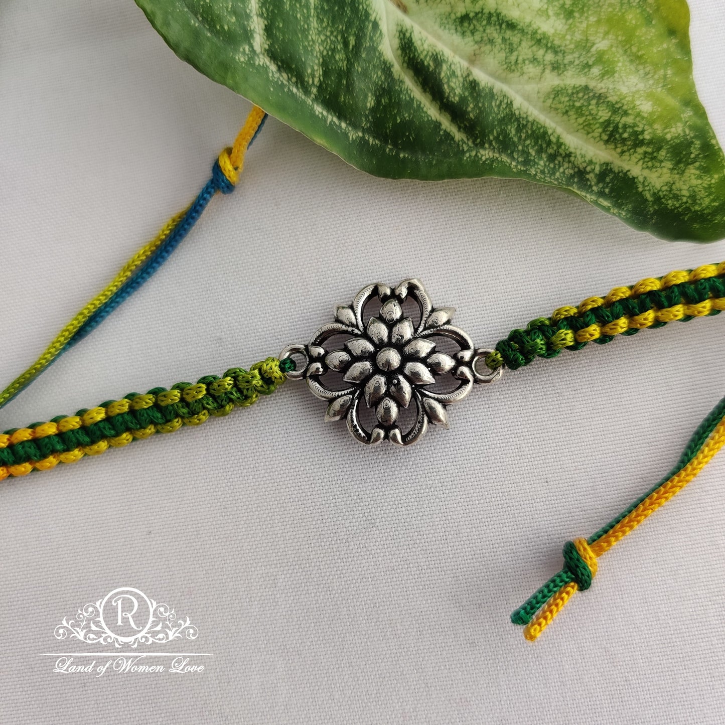 92.5 silver beautiful flower design rakhi :rcg085 92.5 silver ramala jewelry / ramala collections