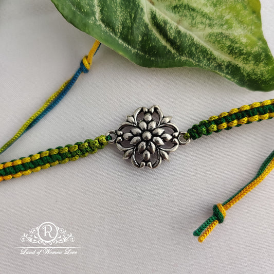 92.5 silver beautiful flower design rakhi :rcg085 92.5 silver ramala jewelry / ramala collections