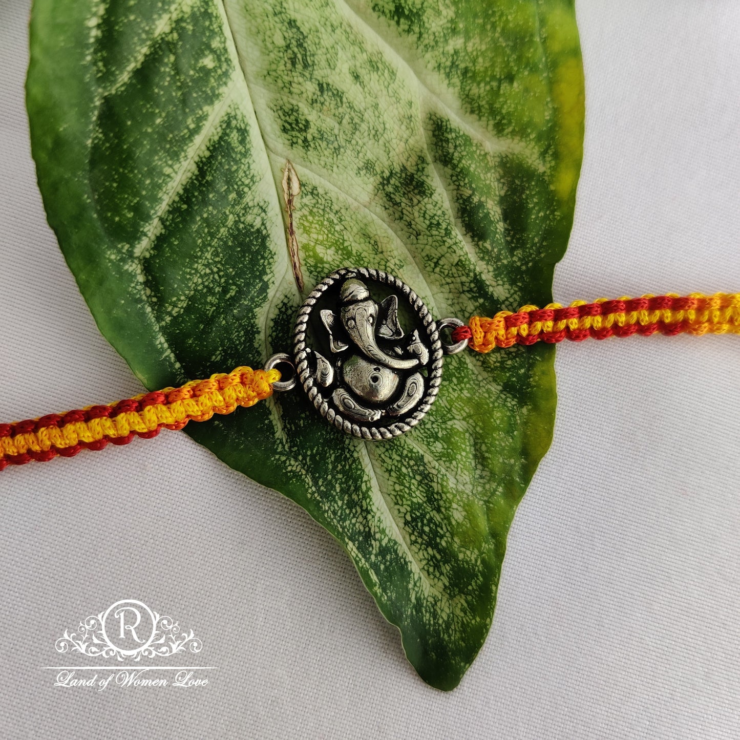 92.5 silver beautiful ganesh rakhi design:rch229 92.5 silver ramala jewelry / ramala collections