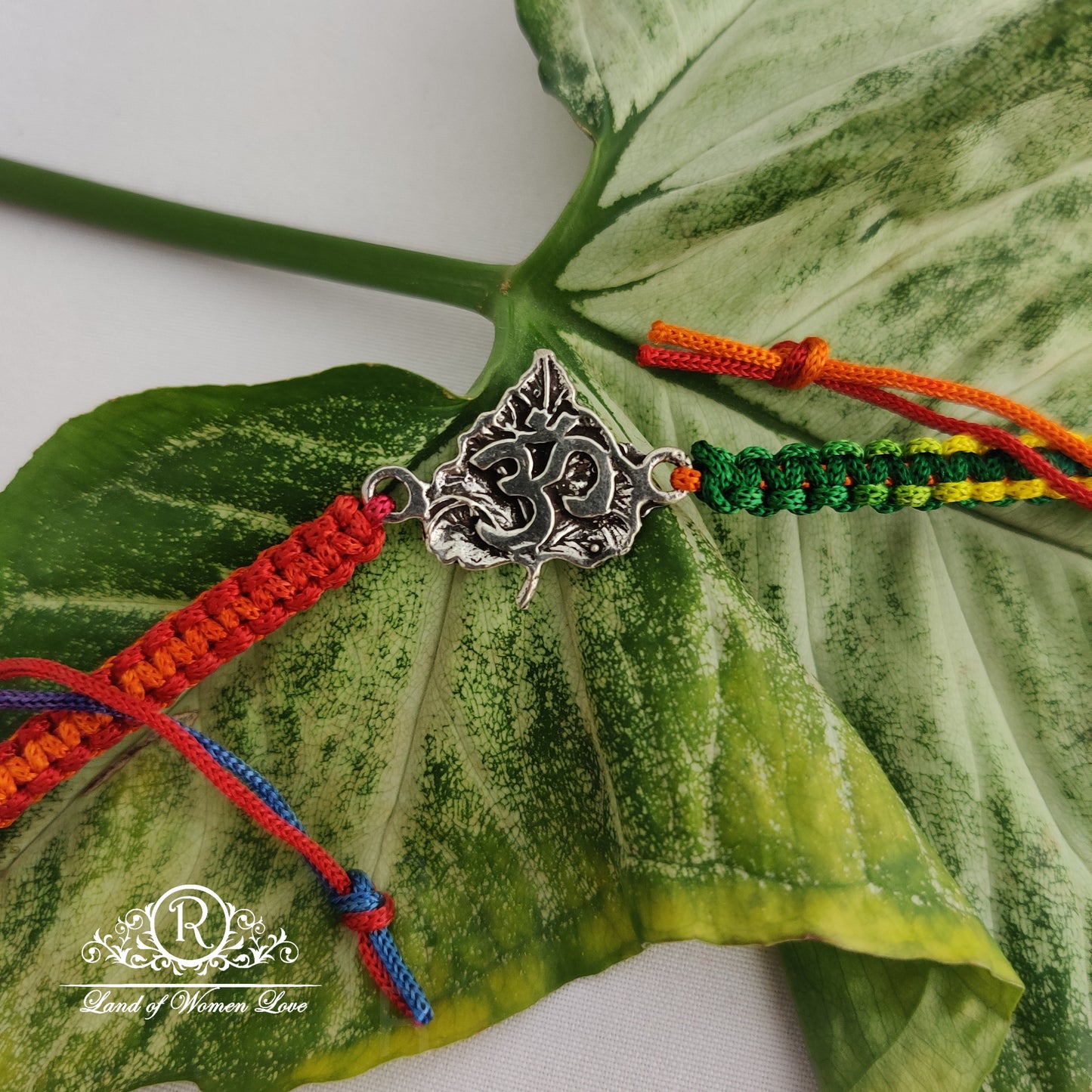 92.5 silver beautiful "leaf om" rakhi design :rcg122,rcg123,rcg135 92.5 silver ramala jewelry / ramala collections