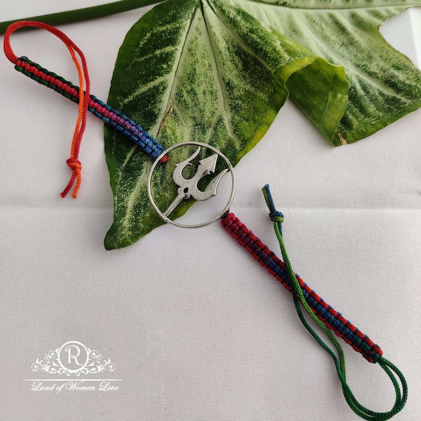 92.5 silver beautiful thrisulam rakhi:rcg092 92.5 silver ramala jewelry / ramala collections