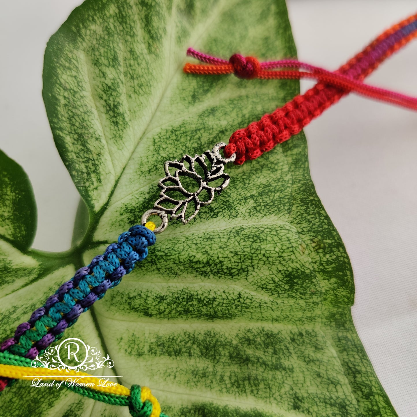 92.5 silver beautiful lotus rakhi: rcg094,rcg099,rcg108 92.5 silver ramala jewelry / ramala collections