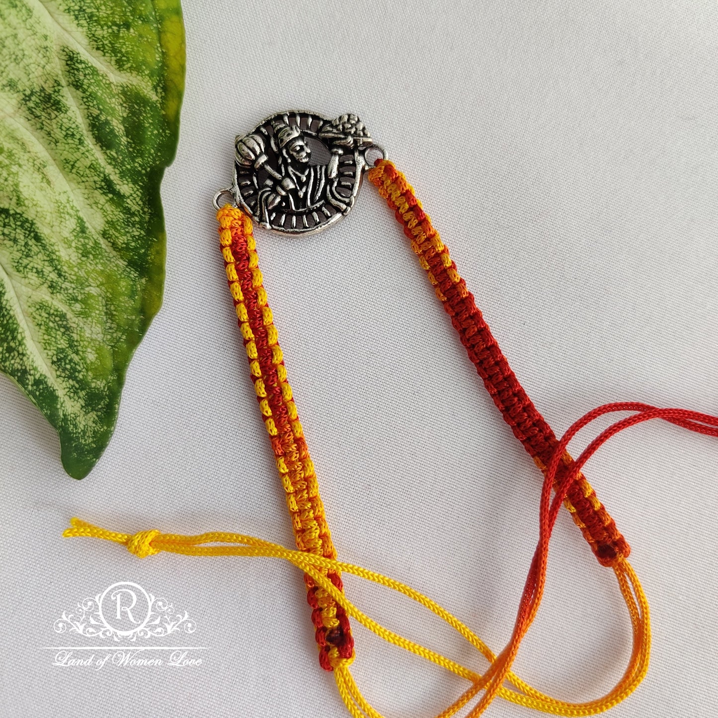 92.5 silver beautiful lord flying hanuman rakhi:rcg093 92.5 silver ramala jewelry / ramala collections