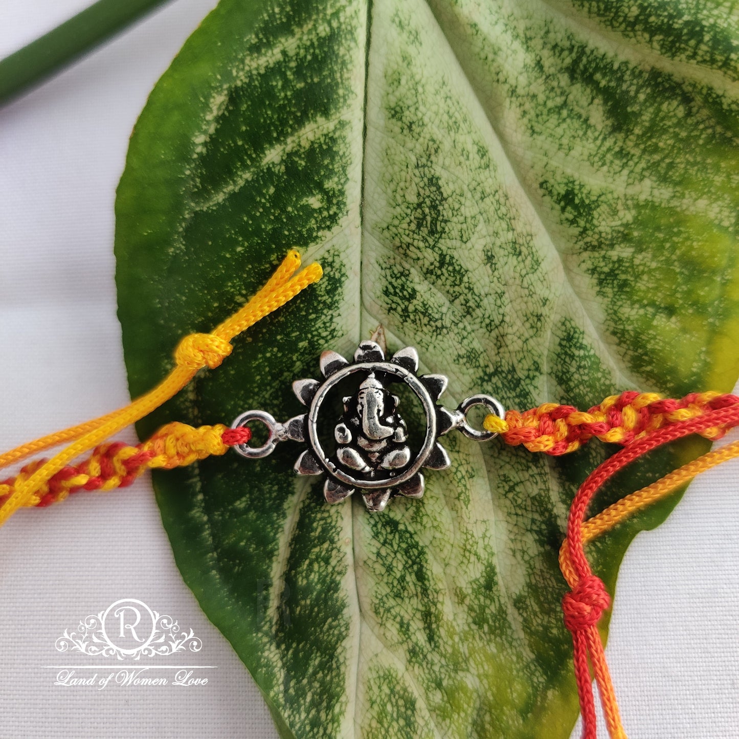 92.5 silver beautiful ganesha rakhi design:rcg138 92.5 silver ramala jewelry / ramala collections