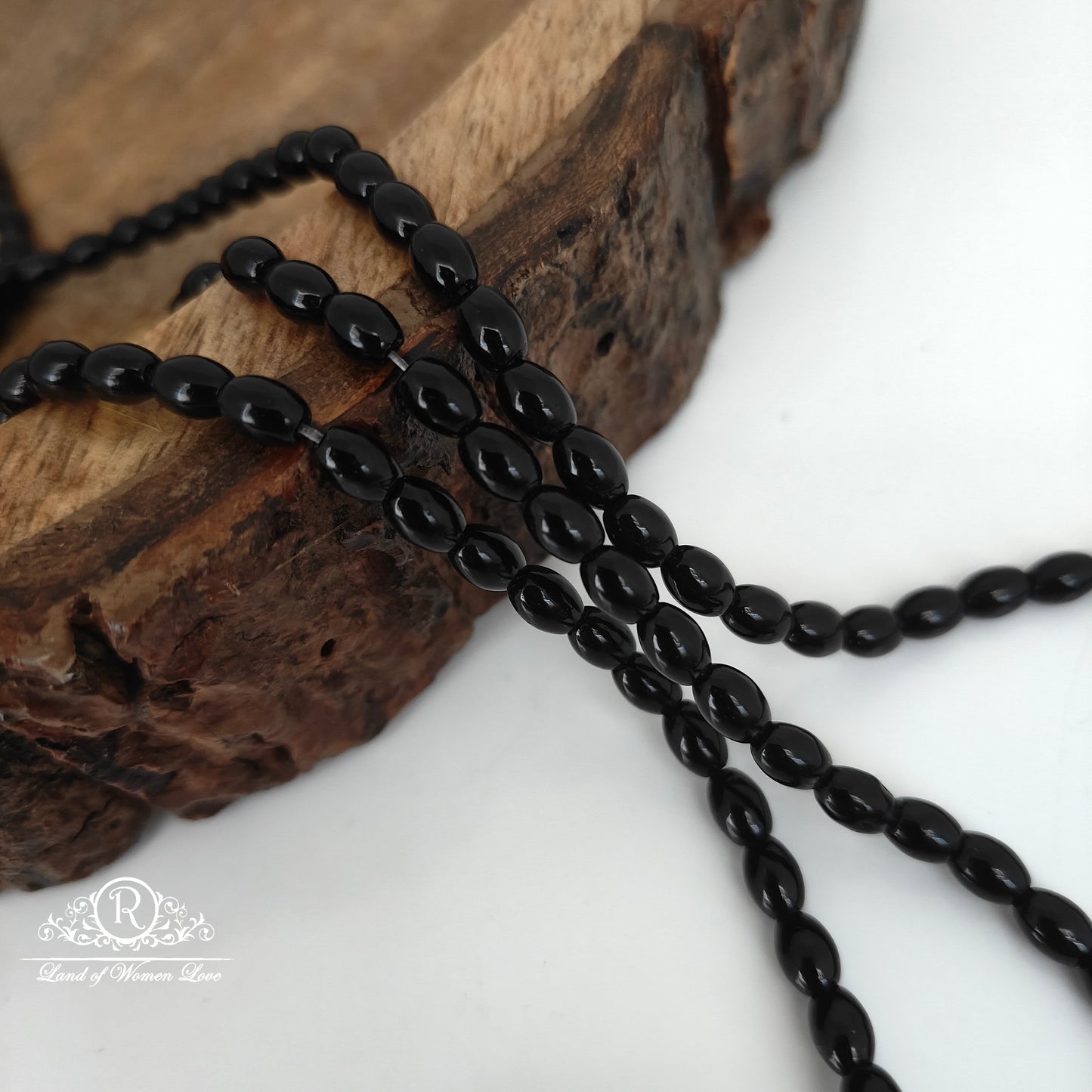 HONEX BLACK OVAL BEADS-RCJM044