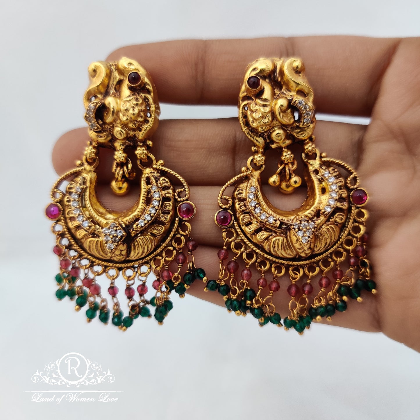 Simple and cute silver Ã¢Å“Â¨ earrings with peacock Ã°Å¸Â¦Å¡ design and hangings -RCM759