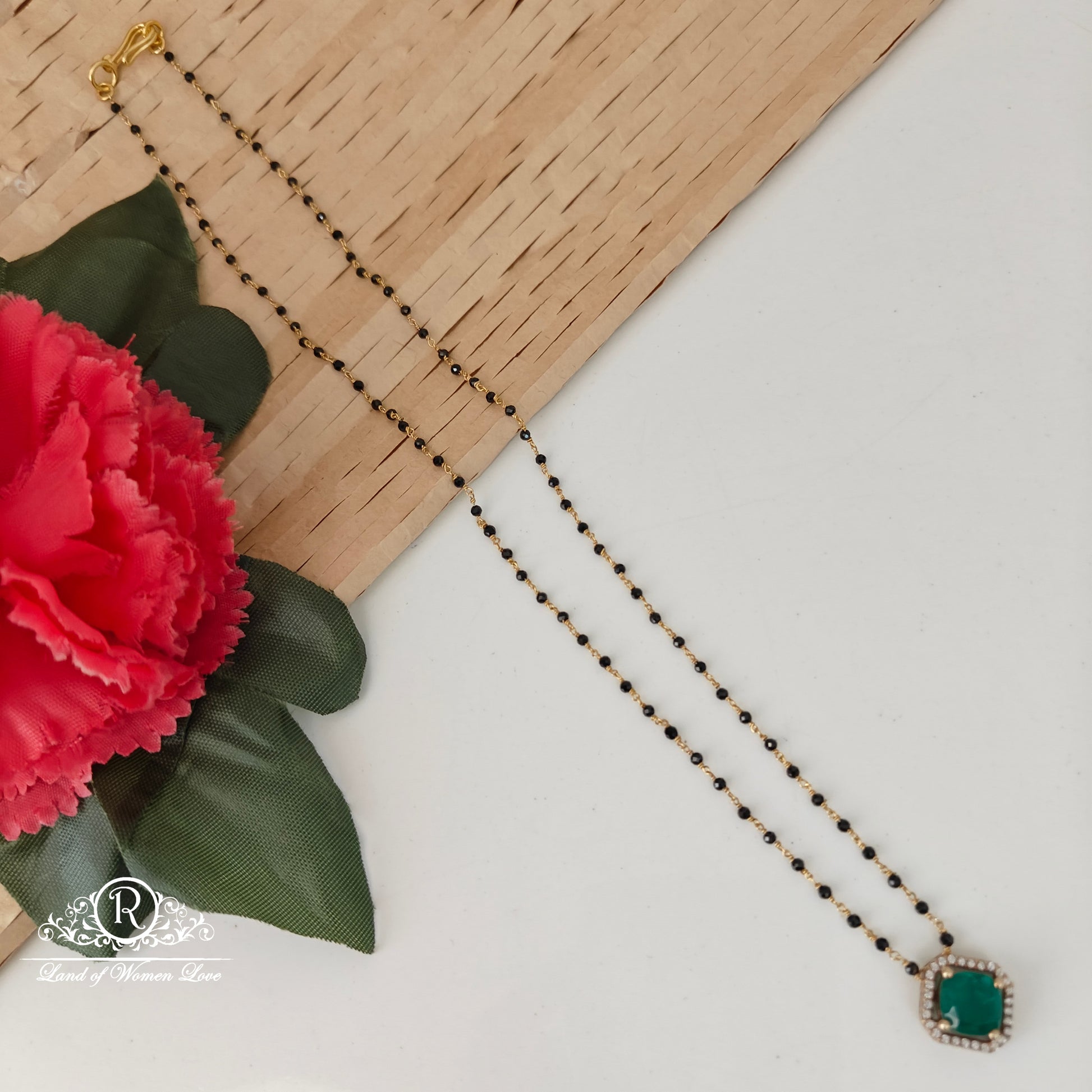 92.5 silver simple and cute black beads with green stone locket -rch956 92.5 silver ramala jewelry / ramala collections