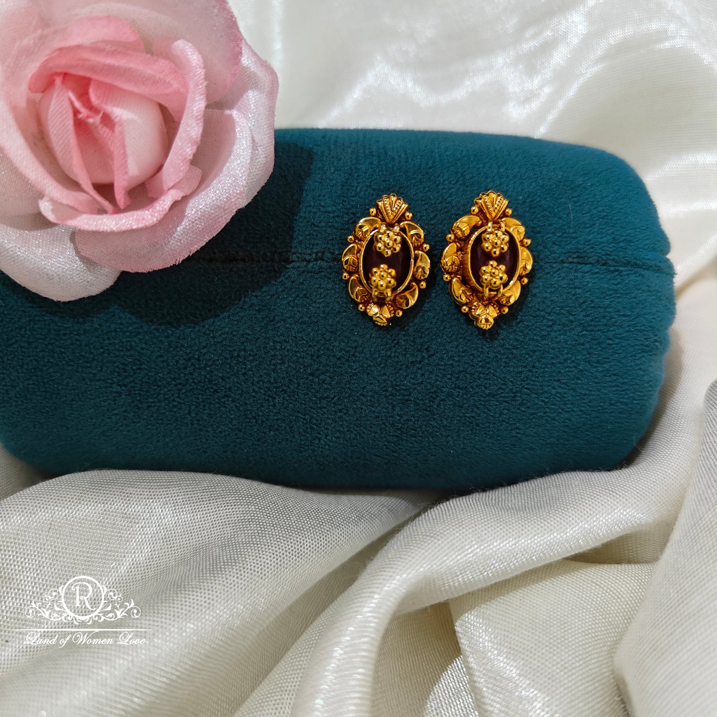92.5 Silver oval shape flower design earrings -RCM1615