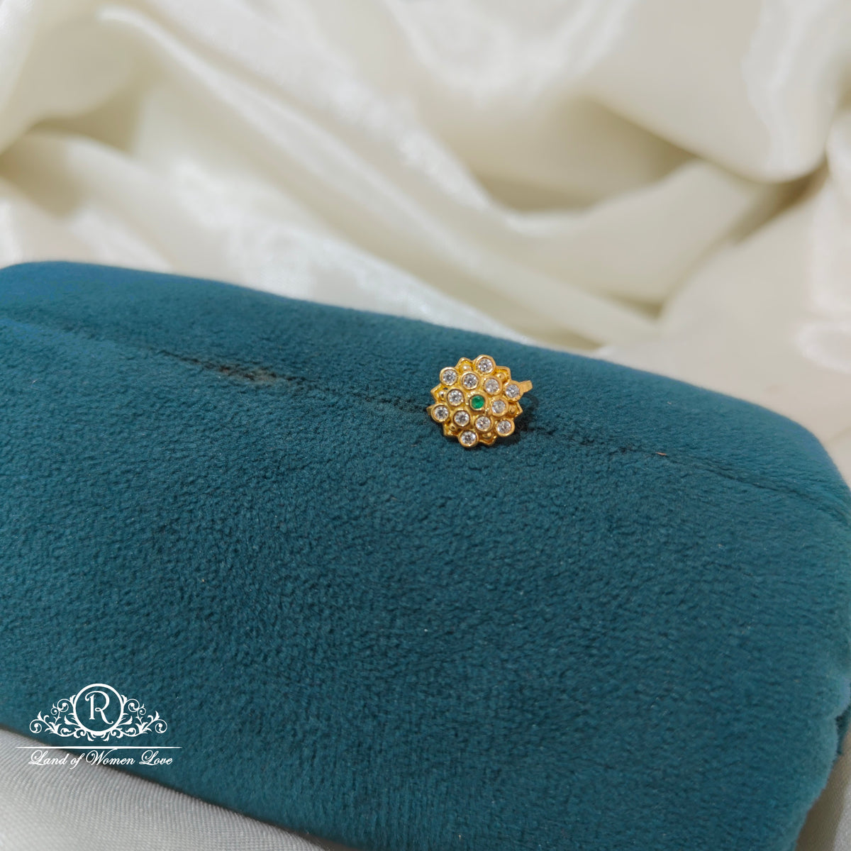 92.5 Silver flower design with green stone nosepin-RCR099