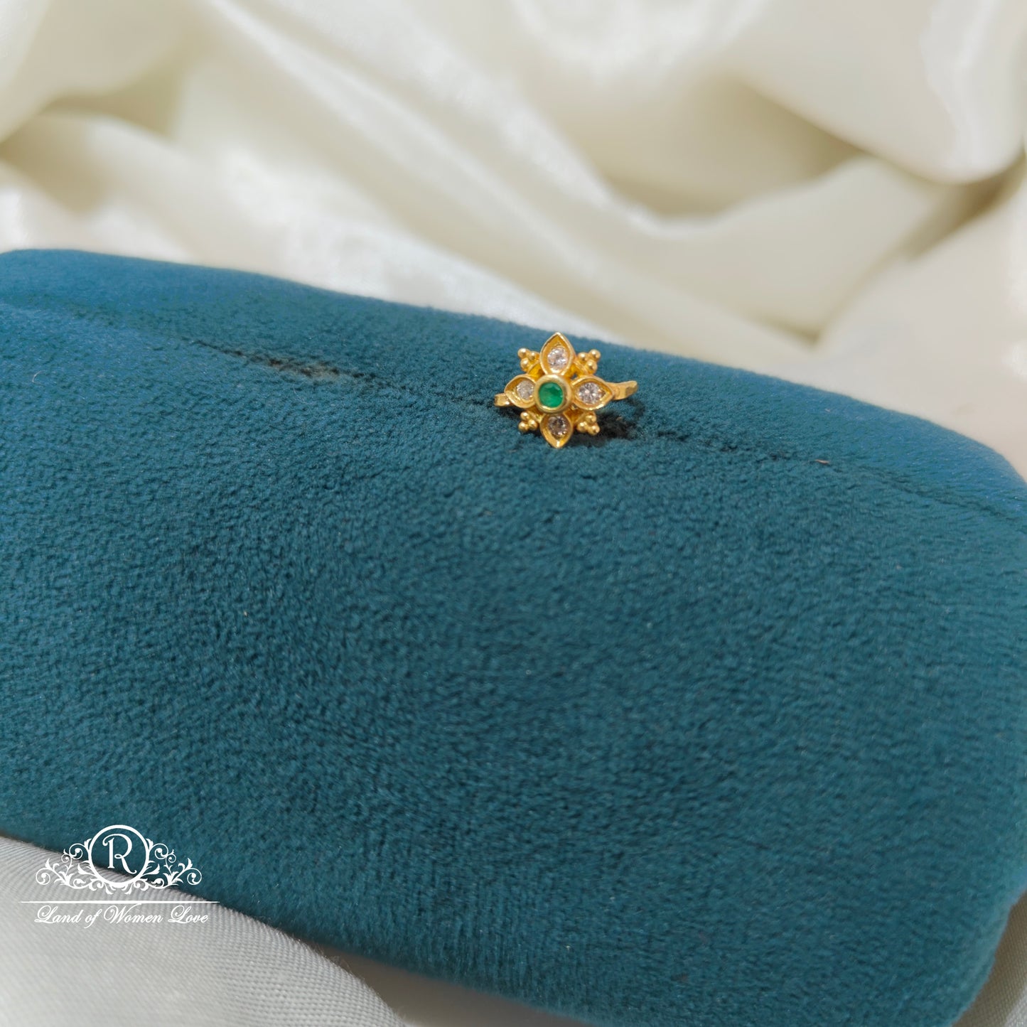 92.5 Silver flower design with green stone nosepin-RCR097