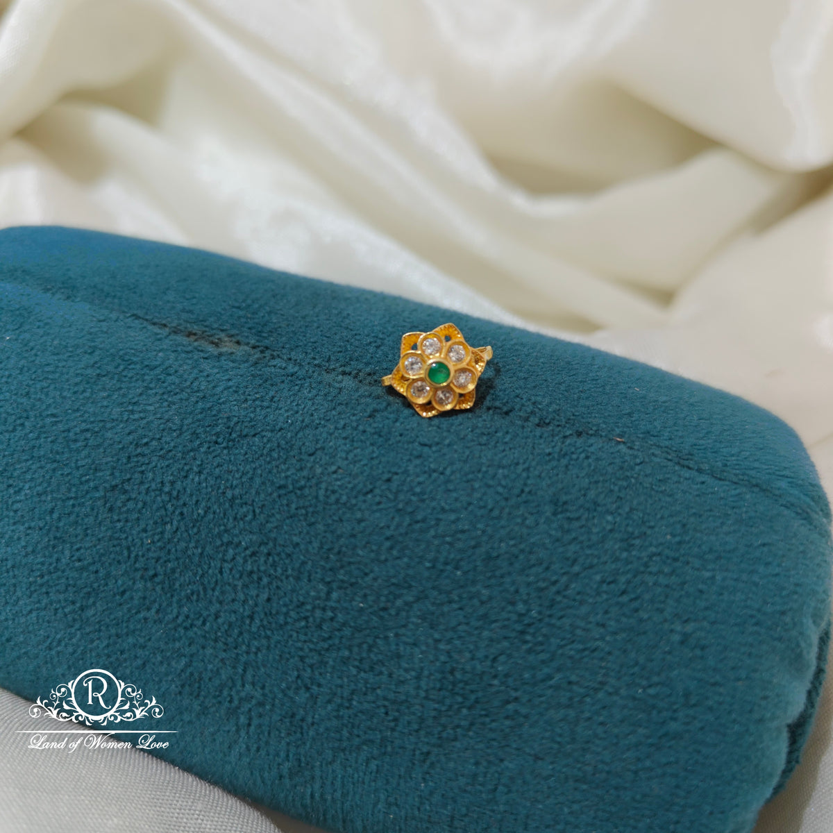 92.5 Silver flower design with green stone nosepin-RCR098